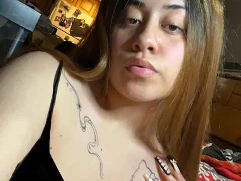 Tener un chat en directo con la modelo cámara web CamilaRX